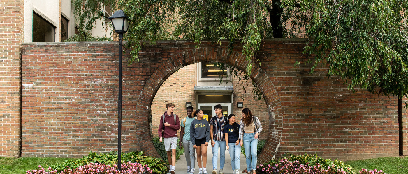 a group of students walking together near Art Museum entrance