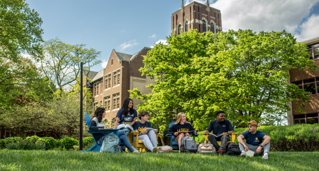 Image of students talking on the Hansen Quad.