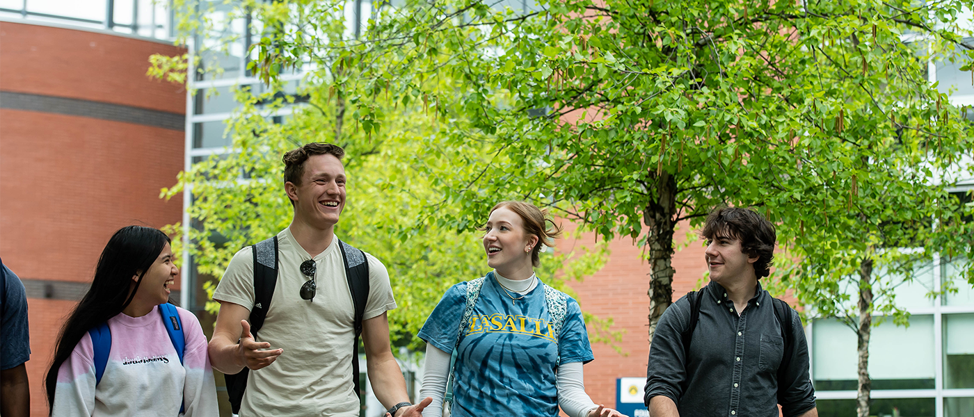 Image of students walking in front of Founders' Hall.