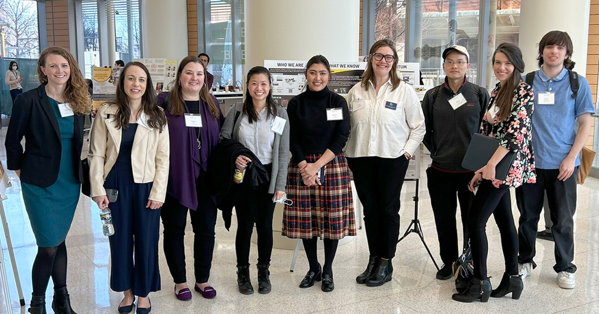 2024 Community-Driven Research Day (CDRD). Left to right: Adjunct Professor Tesla Dubois, M.S., Chair and Professor Kelly Daily, Ph.D., Associate Professor Caitlin Taylor, Ph.D., Assistant Professor Flo Ling, Ph.D., Assistant Professor Nilofar Varzgani, Ph.D., Executive Director Kara Wentworth, Ph.D., Associate Professor Yang Wang, Ph.D., Chair, Management and Associate Professor Meghan Pierce, Ph.D., and Kevin Beideman, ‘26.