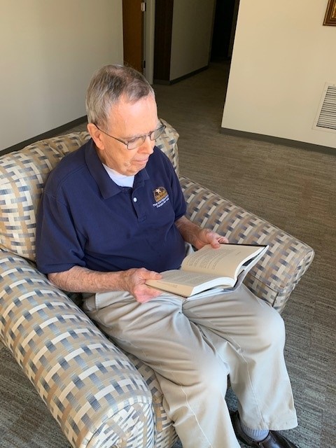 Brother Joseph F. Mahon, FSC reading