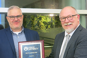 Left to right: Andy Stutzman, M.S. ’06 and Provost and Vice President of Academic Affairs Cameron B. Wesson, Ph.D.