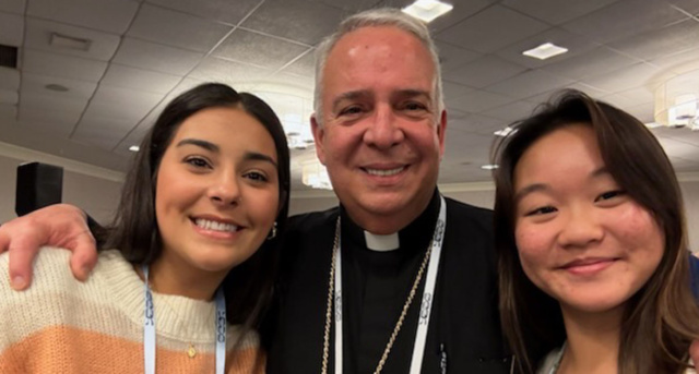 Abigail Griswold, '26, M.A. ‘27 (left) and Haylie Doan, ‘26, M.A. ‘27, met with Philadelphia Archbishop Nelson J. Pérez at SEEK25 in Washington, D.C.